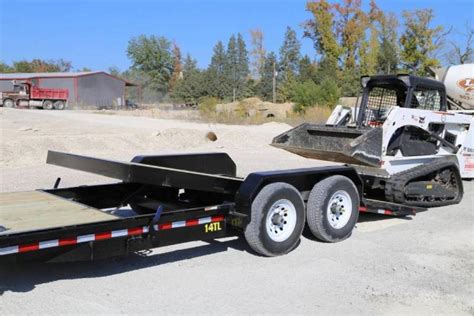 skid steer in a dump trailer|tilt bed skid loader trailers.